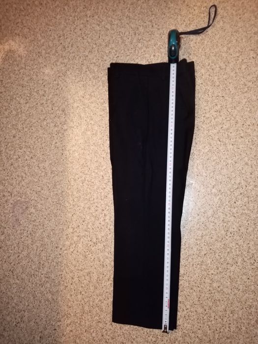 Чёрные брюки на мальчика 134