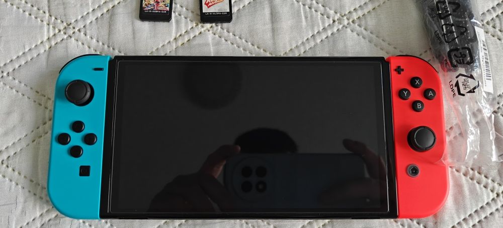 Nintendo Switch OLED + Mario Kart 8 Deluxe și RingFit Adventure