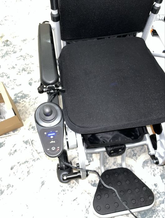 Электронная инвалидная коляска