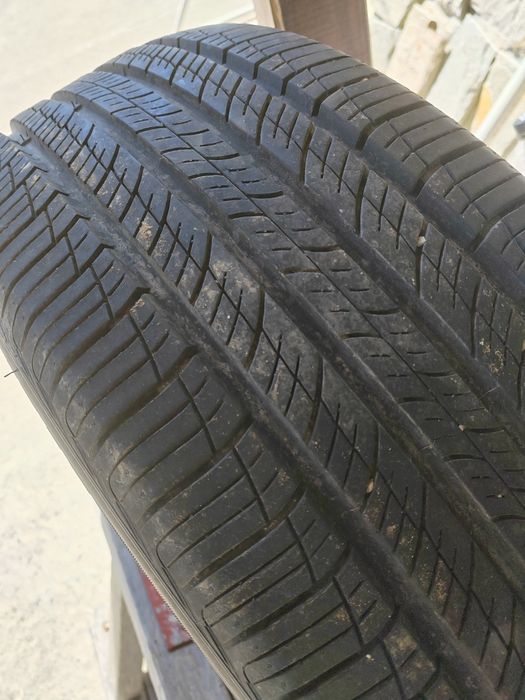 235/60 R18 103 H