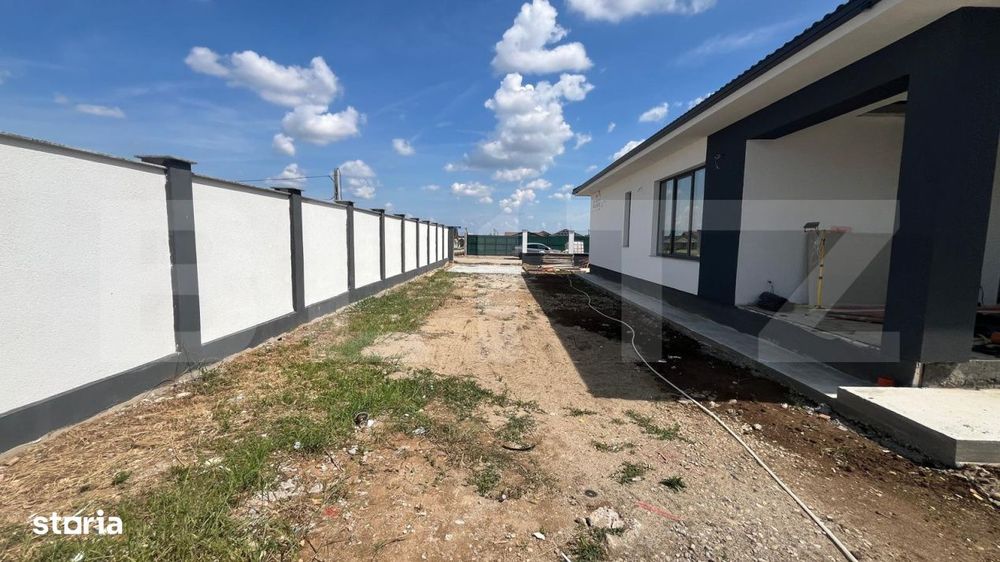 De vanzare casa in Santandrei cu garaj si bucatarie de vara 2 fronturi