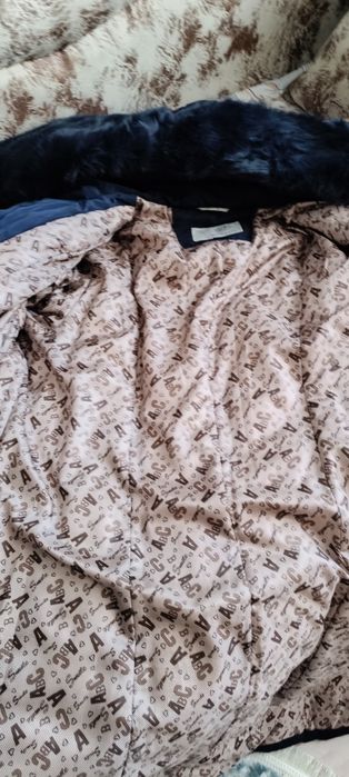 Продам женский пуховик