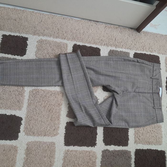 Pantaloni conici carouri Reserved