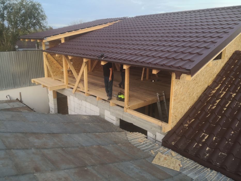 Reparatii acoperis montaj tigla metalica mansarde construcții