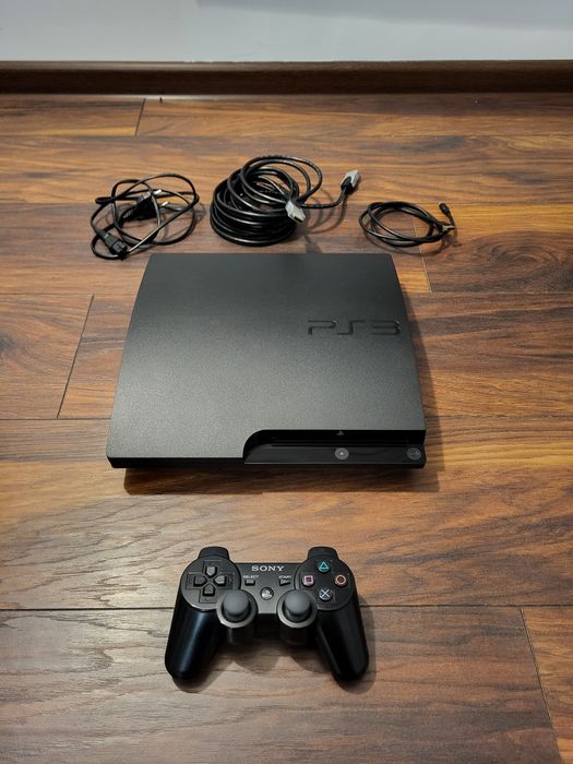 Playstation 3  modat, hdd 160 gb + multe jocuri ps3 pe hard + simulator auto (volan+pedale Koning+cutie) compatibil PS si PC