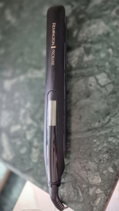 Vand placa de par Remington + husa