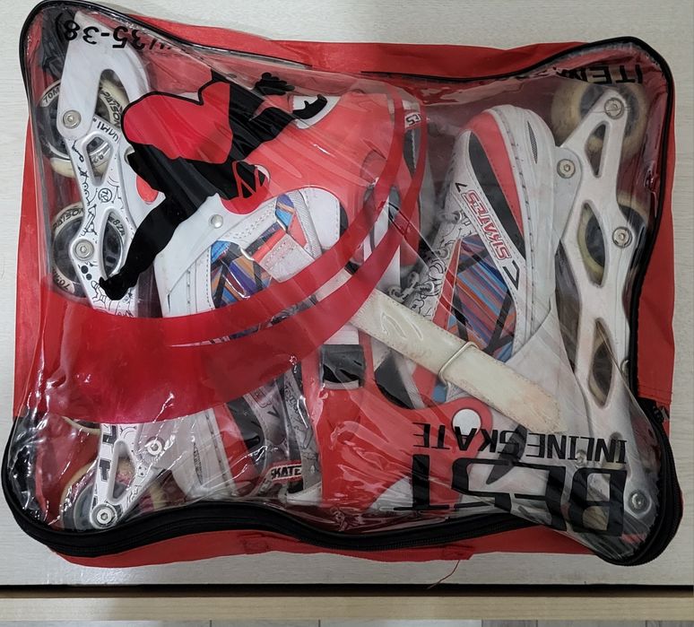 Роликовые коньки