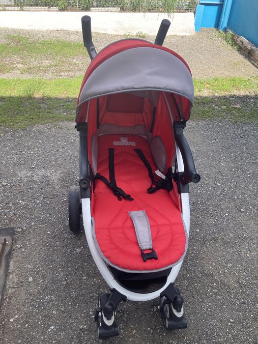 Продам детскую коляску в красном цвете