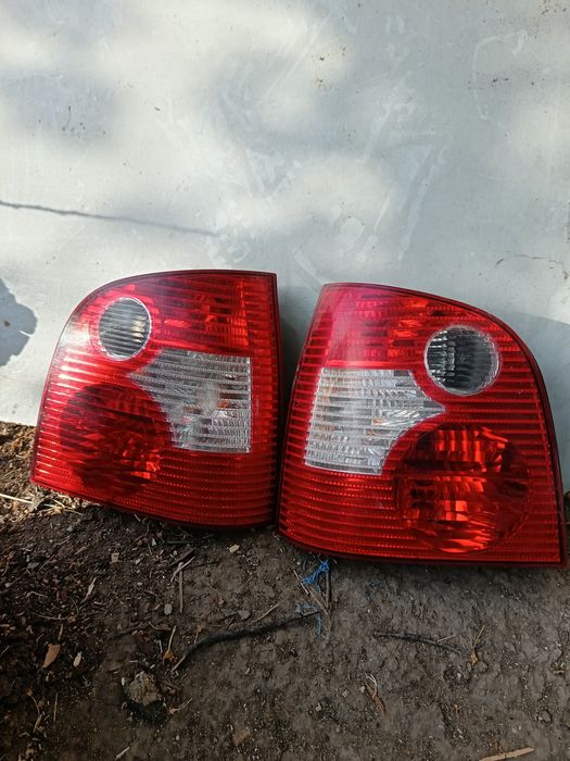 Stop-uri stanga si dreapta spate vw Polo 9N cu becuri
