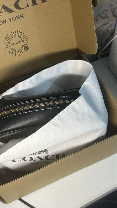 Сумка от бренда Coach