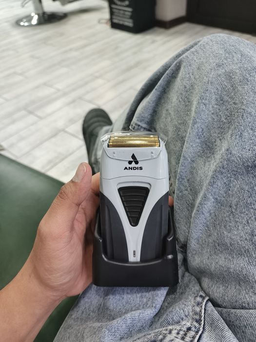 Триммер Andis новый.