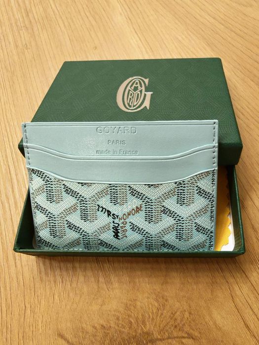 Goyard and Dior cardholders
