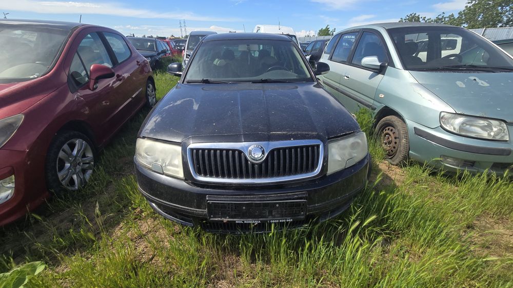 Skoda superb capota bara faruri aripa usi usa portbagaj hayon far grila trager armatura stopuri stop cutie viteze electromotor motor 1.9  oglinda
