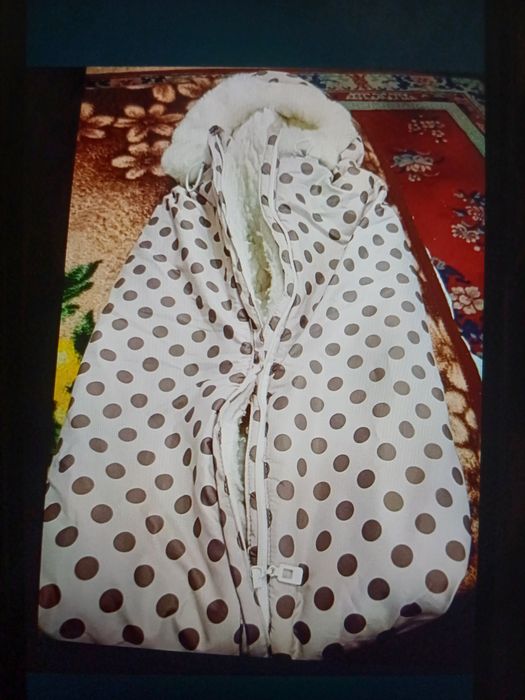 Продам тёплый комбинезон для выписки.