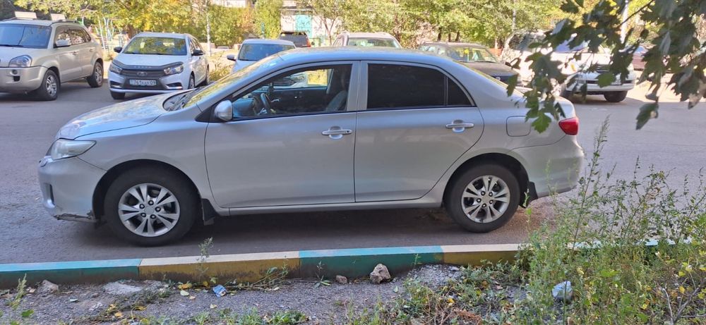 Тайота каролла серого цвета