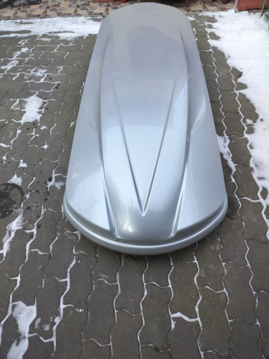 Cutie portbagaj  ca și nouă