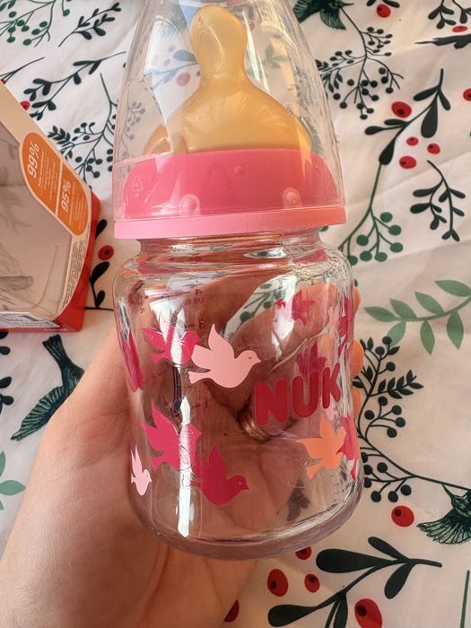 Стъклено шише с каучуков биберон Nuk - 120мл розово