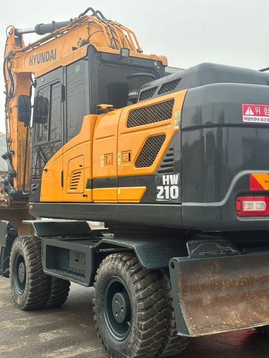 Услуги экскаватора колесного 210