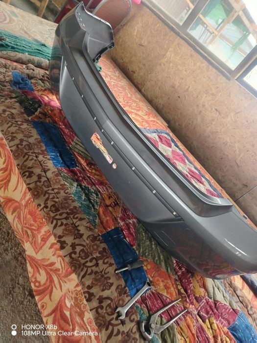 Бампер от кобальта заднии