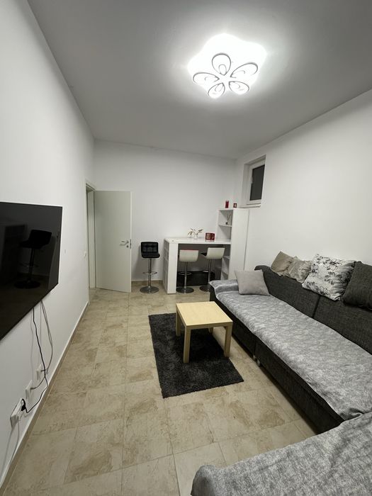 Inchiriez apartament 2 camere situat la demisol inalt