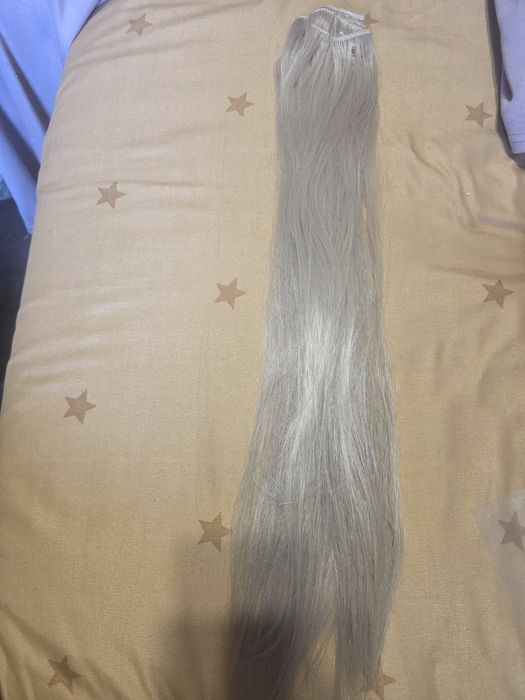 Vând extensii din par natural cu clips.Produs nou