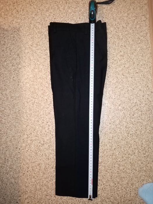 Чёрные брюки на мальчика 134