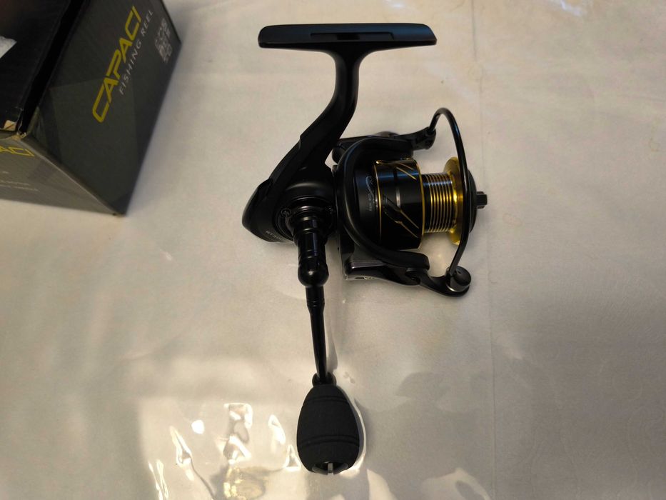 Продам новый спиннинговую катушку 3000