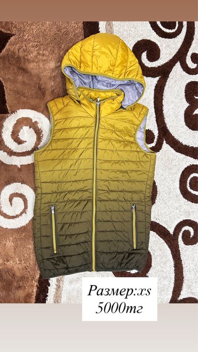 Женская жилетка .