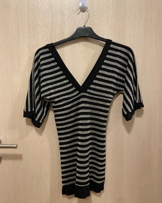 Bluza decoltata și elegantă