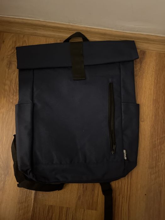 Roll top backpack