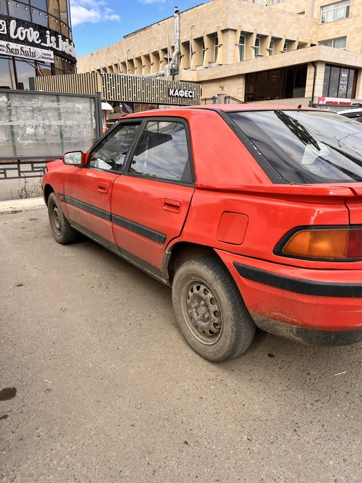 Продам машину,323F