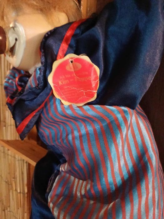 Стар  порцеланов люлеещ се клоун