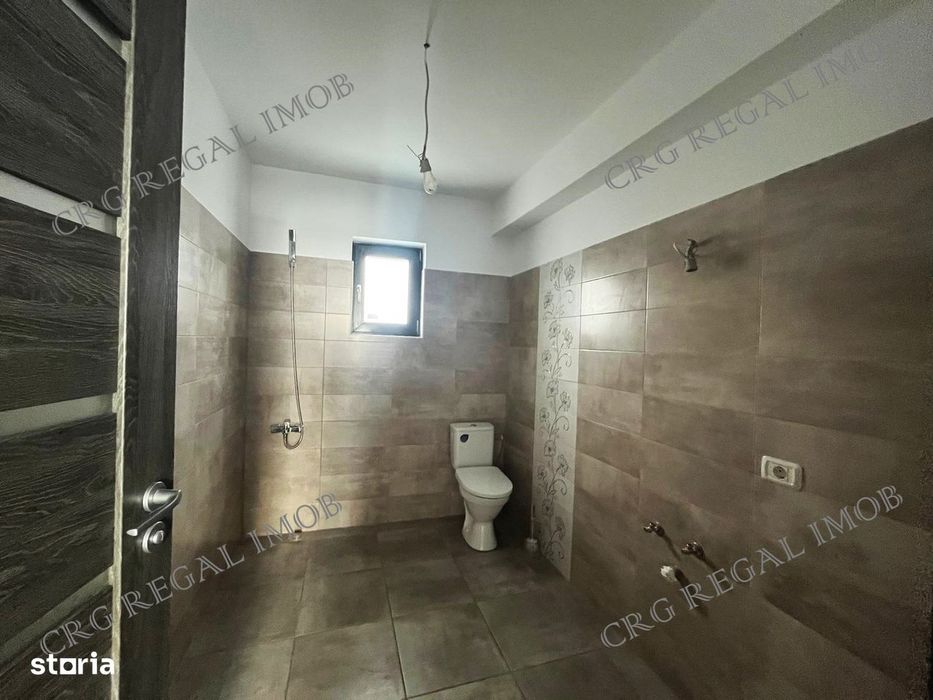 Casa noua cu 5 camere 3 bai curte 419mp comuna Berceni