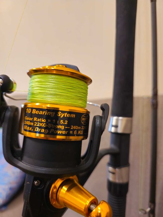 пръчка за море и тролене  Окума ,дълги 2,59,с макара и плетено влакно