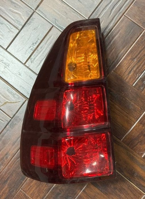 Фонарь задний левый Toyota Prado 120 (Lexus 470) оригинал с фишками