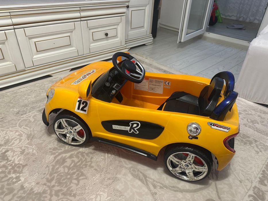 Masina electrica pentru copii