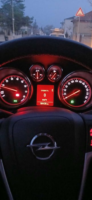 опел астра 1.4 бензин с турбо 2012г.,комби+газ