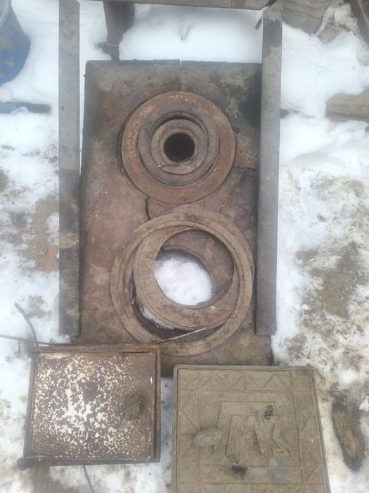 Чугунная плита с кольцами и дверцы