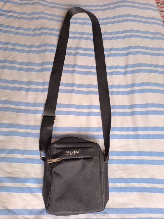 Мъжки чантички и портфейли