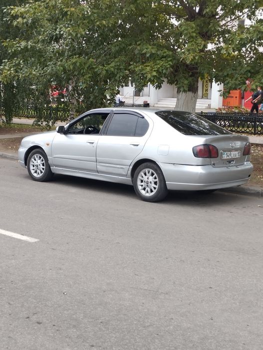 Нисан примьера р11