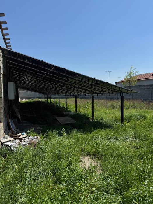 Продаётся земля 12 соток с солнечними панелями 50кв. Доход 1000$ в мес