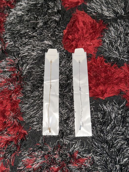 Bratara Yves Saint Laurent Argintie si Aurie