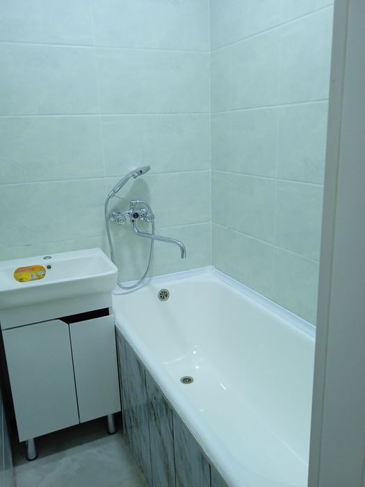 Квартира янги ремонтдан чикган локацияси зур миллий банк ёнида юл усти