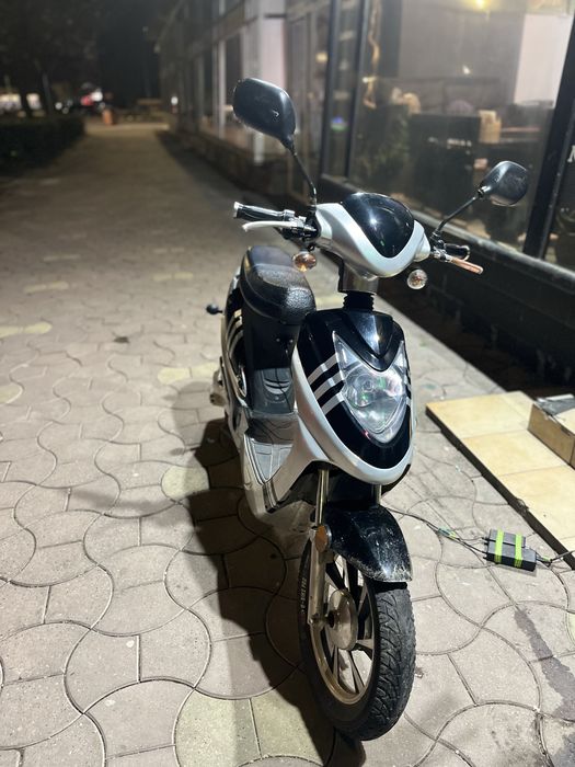 Vand/schimb scuter electric