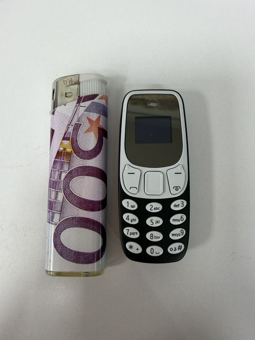 Мини телефон с 3 сменящи се гласа