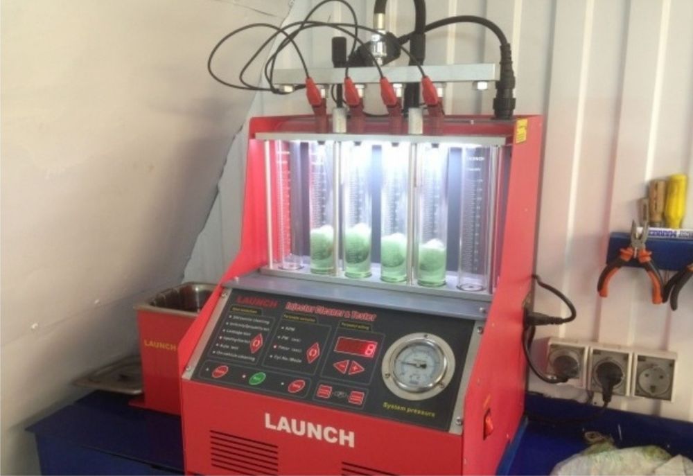 промывка форсунок на стенде ультразвуком. чистка форсунок на стенде. стенды для прочистки инжекторов. промывка и диагностика бензиновых форсунок. стенд для ультразвуковой очистки форсунок инжектора.