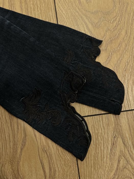 Женские джинсы Versace