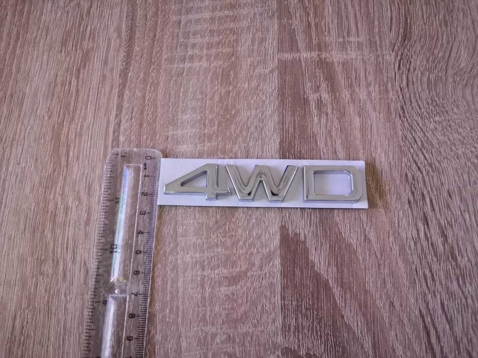 сребриста емблема Kia 4WD