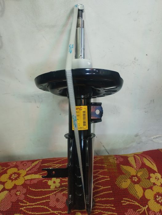 Малибу 2 амортизатор ,передний левый