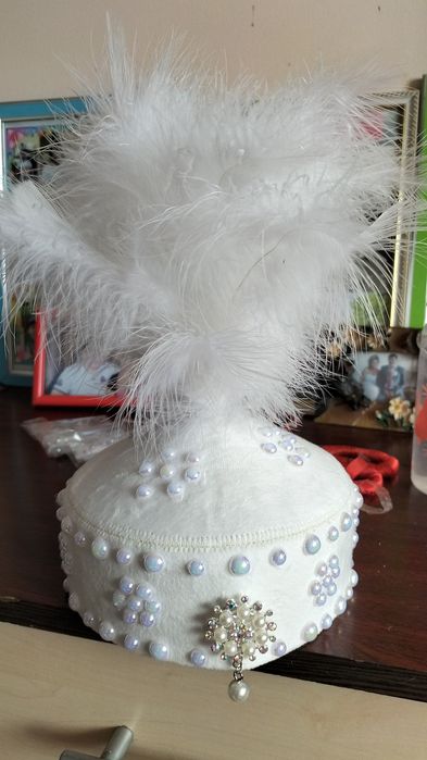 1-жас қызға үкілі тақия